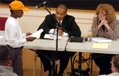 Children testify at the Board of Regents hearing to open new charter schools.  Listening is RIDE's 
head of charter schools, Keith Oliviera, and fellow Regents member Colleen Callahan